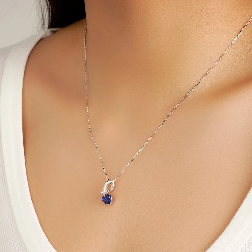 1 CT. Heart-Shaped Sapphire Ribbon Pendant with Diamond