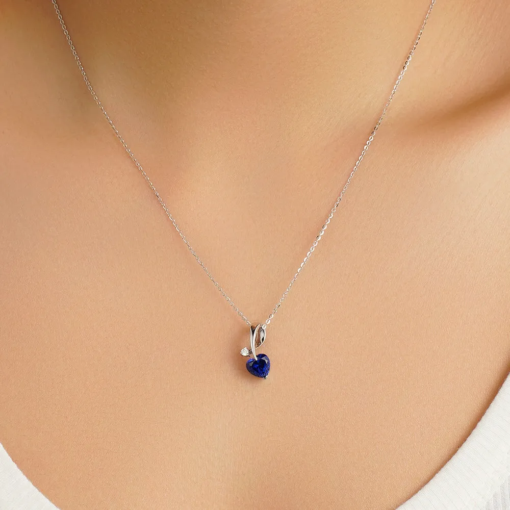 1 CT. Heart-Shaped Sapphire Ribbon Pendant with Diamond